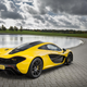 Illustration for article titled McLaren P1: 0-62 MPH In 2.8 Seconds, 28 MPG, OMG, OMG, OMG
